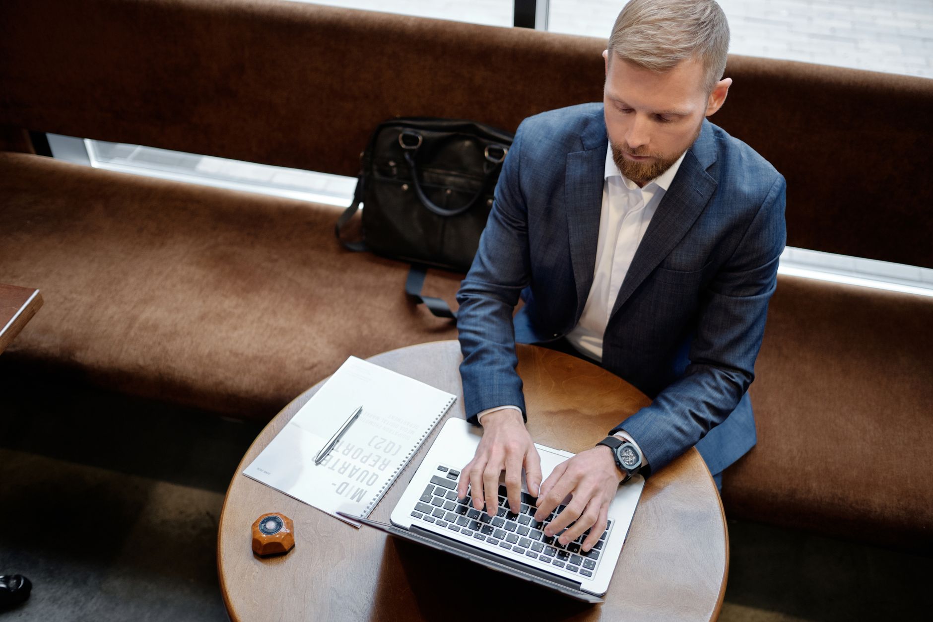 Laptop and notebook on a table